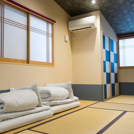 Guesthouse Zennichi Kyōto Esterno foto