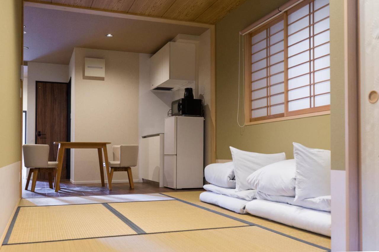 Guesthouse Zennichi Kyōto Esterno foto