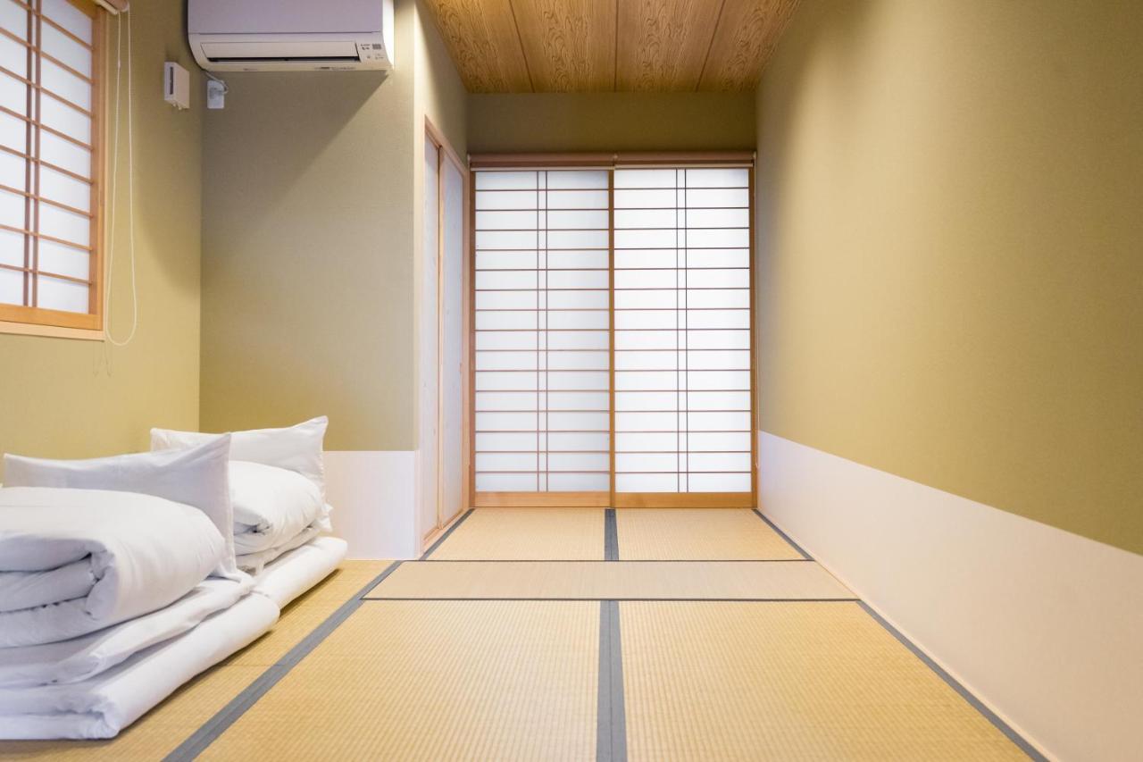 Guesthouse Zennichi Kyōto Esterno foto