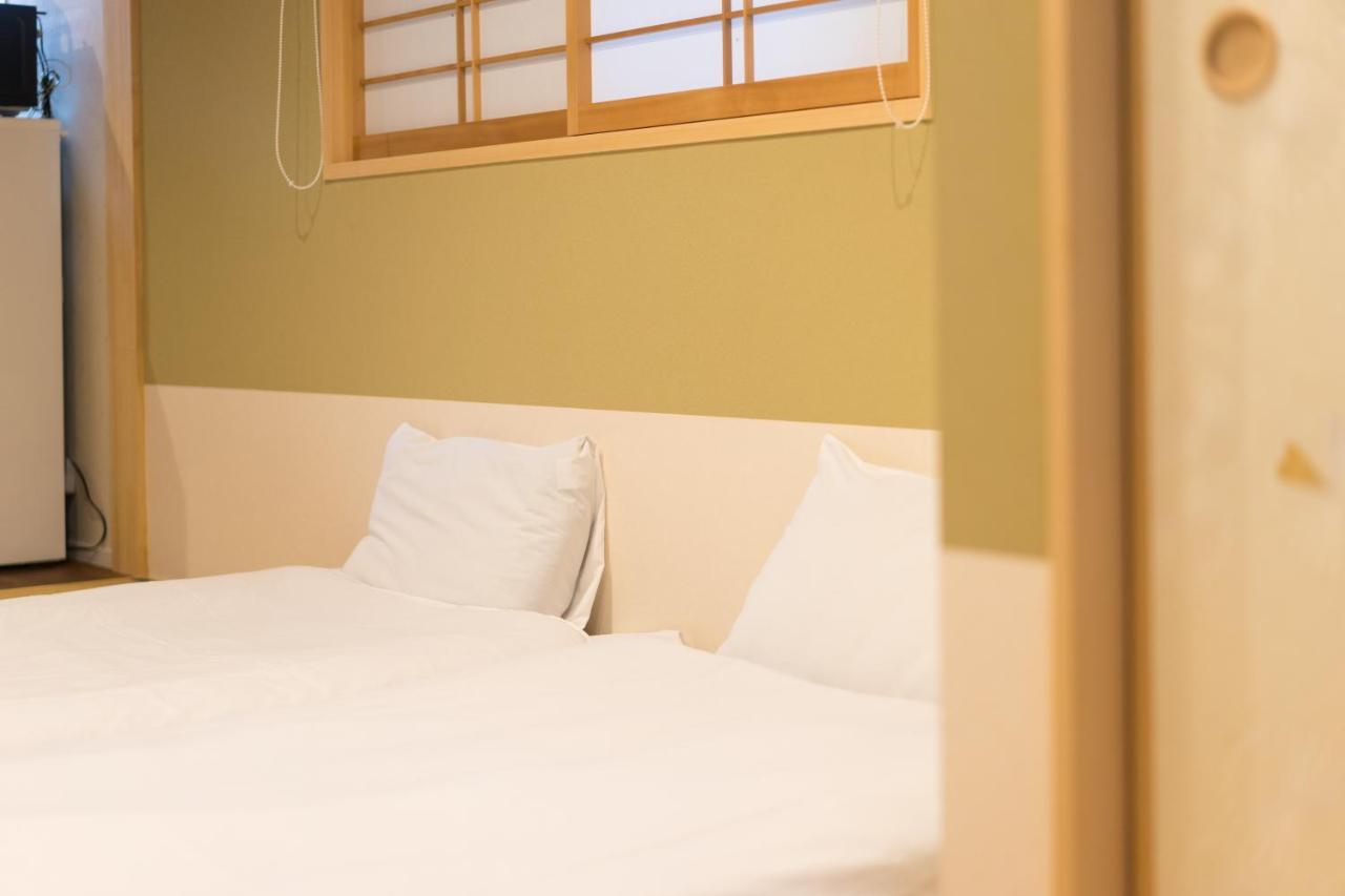 Guesthouse Zennichi Kyōto Esterno foto