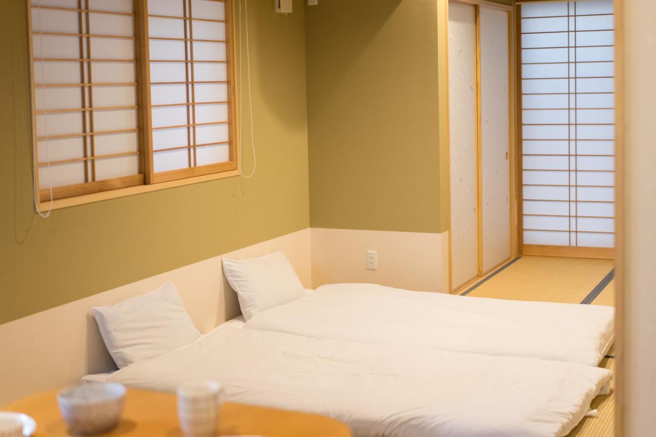 Guesthouse Zennichi Kyōto Esterno foto