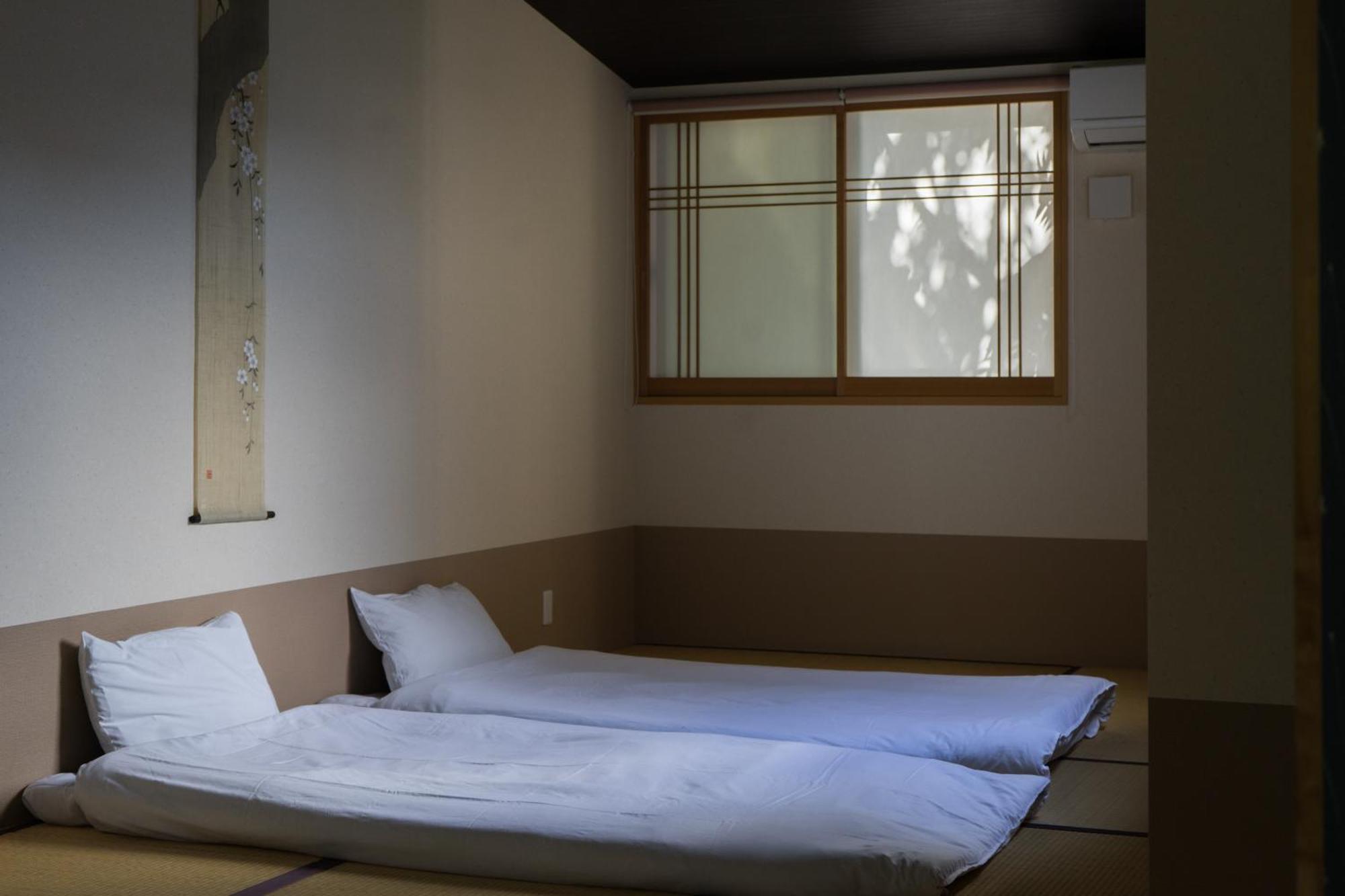 Guesthouse Zennichi Kyōto Esterno foto